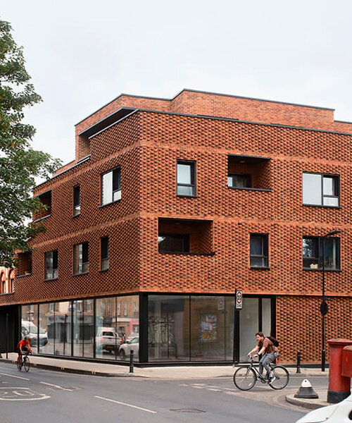 DROO covers residential unit's protruding volumes in textured brickwork in london