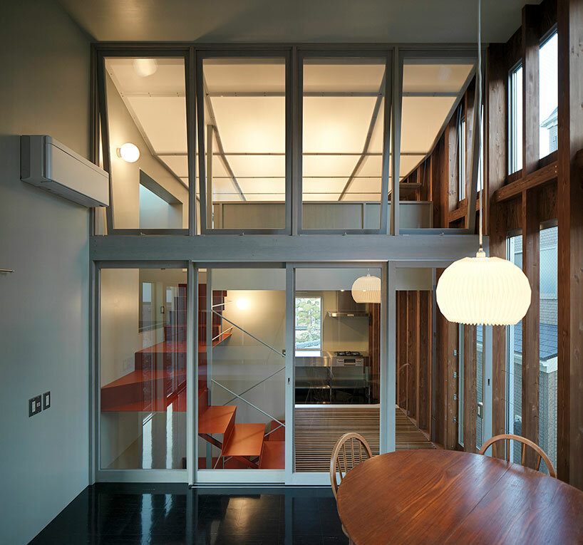 split-level platforms build up archidivision's dance floor house in tokyo