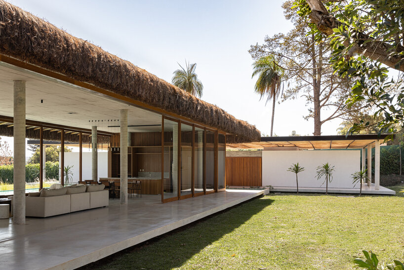 debaixo do bloco redefines tropical living with 3 box house in brazil