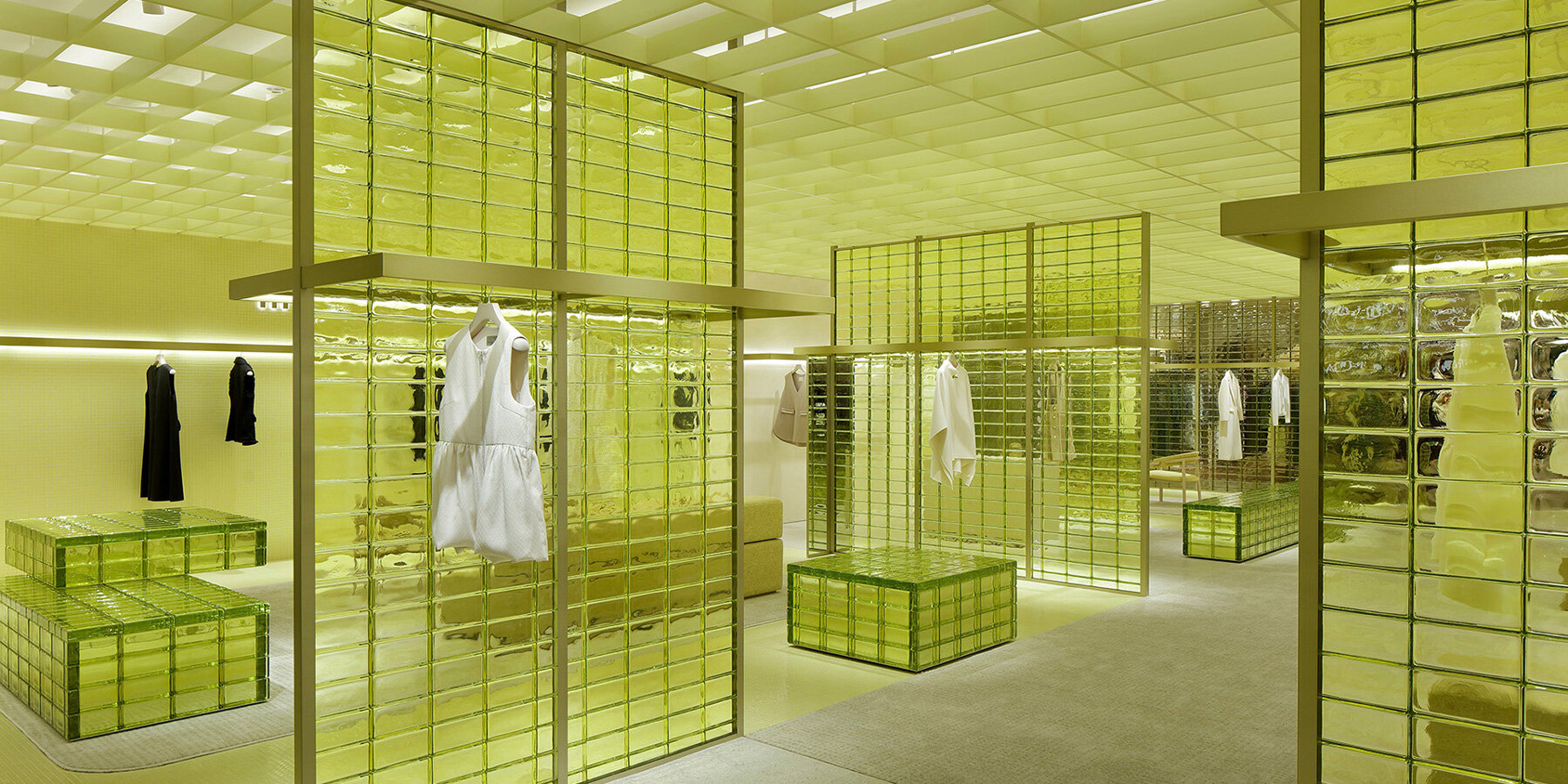 yellow glass bricks shape curiosity's labyrinthine store in osaka