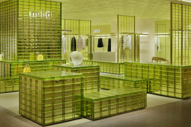 yellow glass bricks shape curiosity's labyrinthine store in osaka