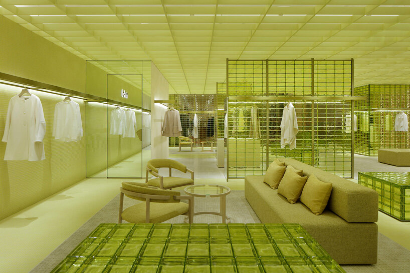 yellow glass bricks shape curiosity's labyrinthine store in osaka