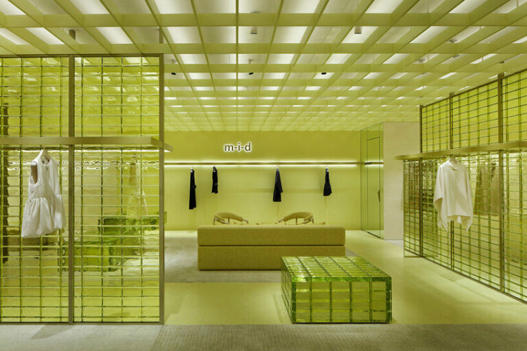 yellow glass bricks shape curiosity's labyrinthine store in osaka