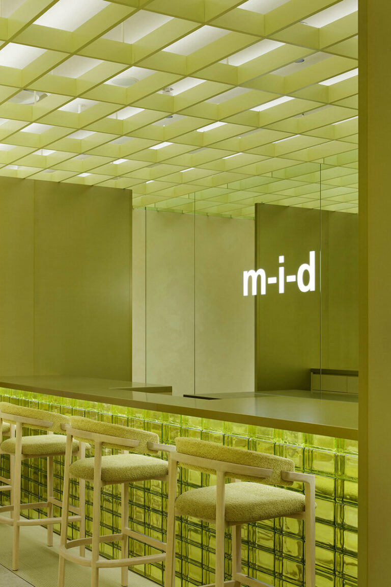 yellow glass bricks shape curiosity's labyrinthine store in osaka