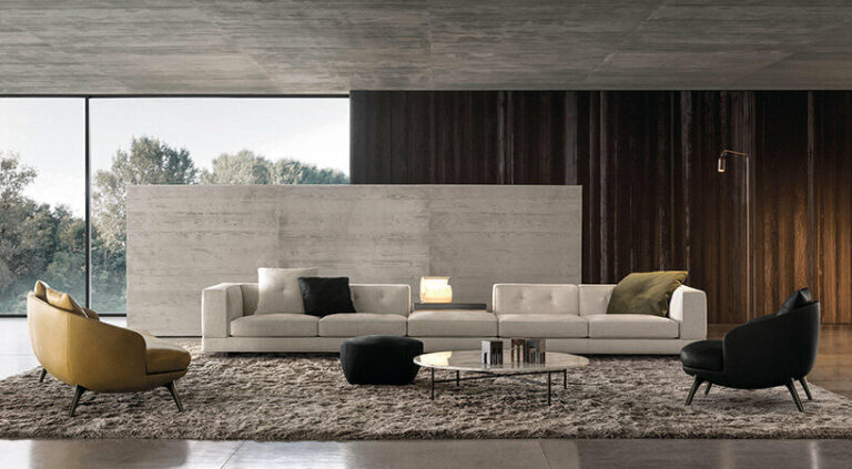 minotti 2023 furniture collection balances solid volumes and organic lines