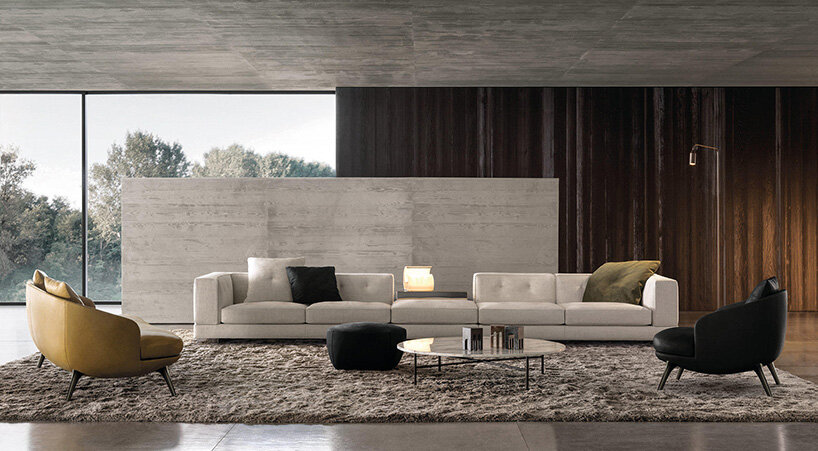 minotti 2023 furniture collection balances solid volumes and organic lines