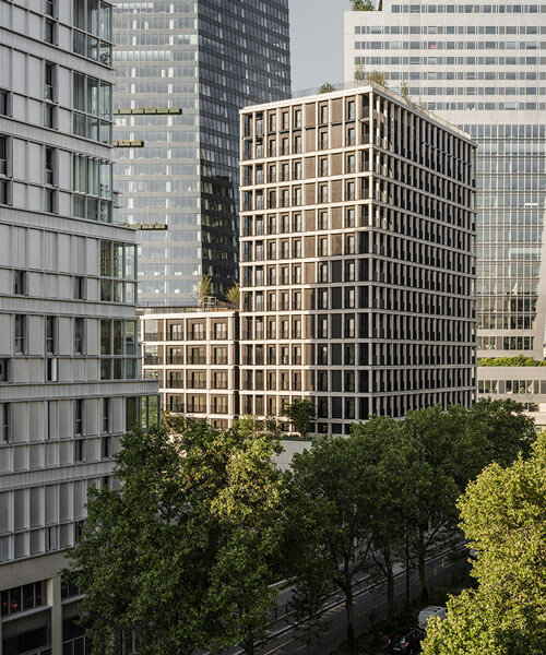 moreau kusunoki completes 'le berlier,' a charred-timber tower in paris