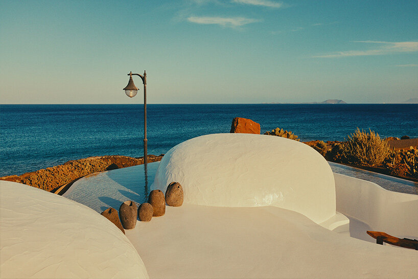 david altrath captures cave-like restaurant terrace overlooking the canary islands ocean
