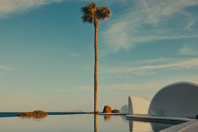 david altrath captures cave-like restaurant terrace overlooking the canary ocean blue 
