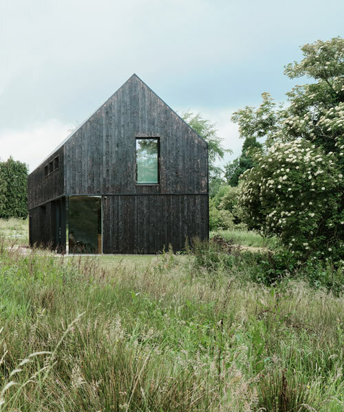 loader monteith architects nestles a base for cyclists in a scottish meadow