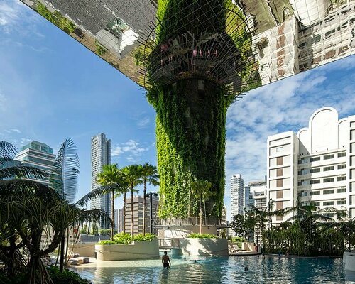 thomas heatherwick's learning hub is comprised of 12 towers