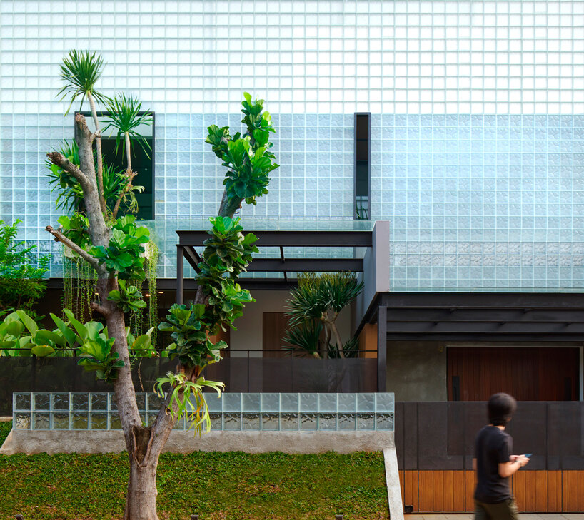 glass block skin enfolds refraction house by RAD+ar in indonesia