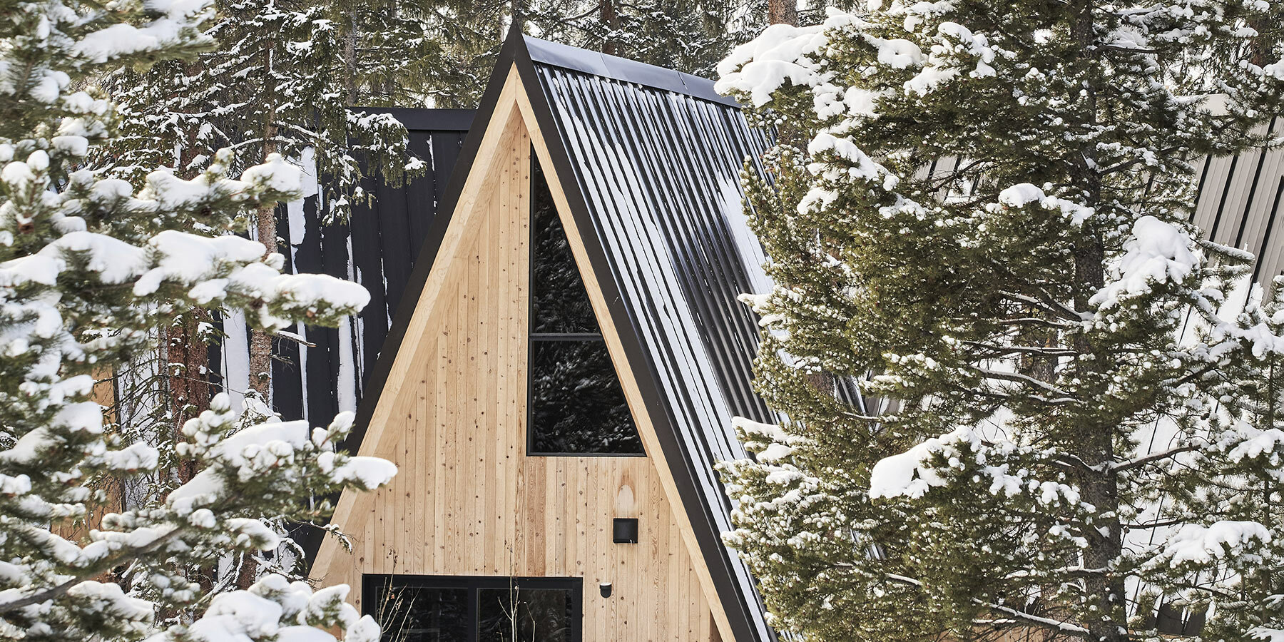 skylab's A-frame club is a cluster of mid-century cabins in colorado