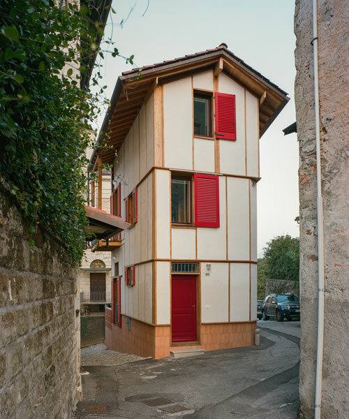 studio albori rebuilds this 'casa di legno e paglia' with larch wood and straw