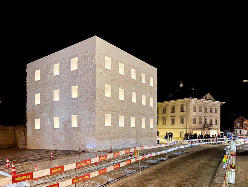 studio other spaces weaves vibrant rugs and boulders into das gelbe haus films for latest exhibition