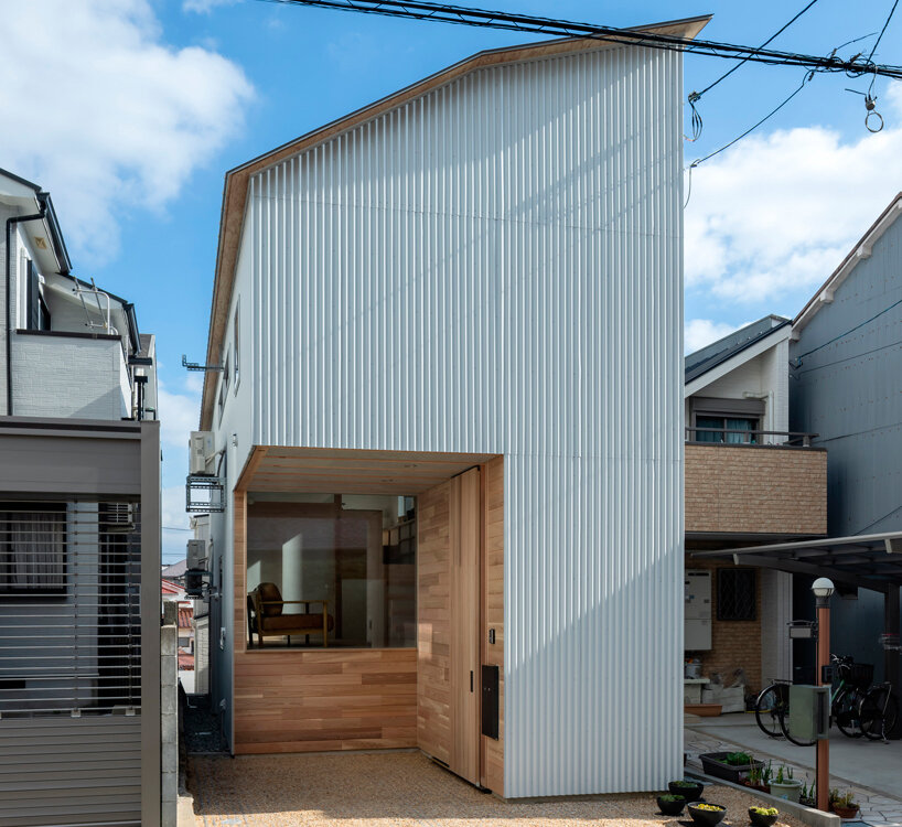 interconnected skipped floors outline the interior of compact toneyama house in japan