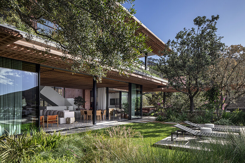 red concrete screens envelop SAOTA's upper albert family home in cape town