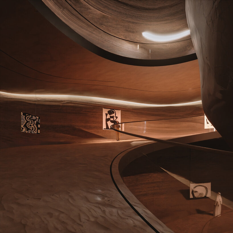 semi-transparent membrane wraps the sculptural body of dubai art museum