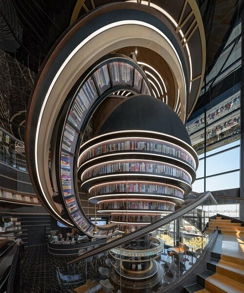 colossal celestial rings enliven x+living's futuristic bookstore in jiangsu, china
