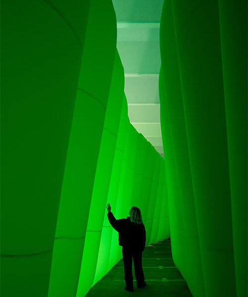 colossal inflatable landscape transforms dutch design week with organic neon green forms