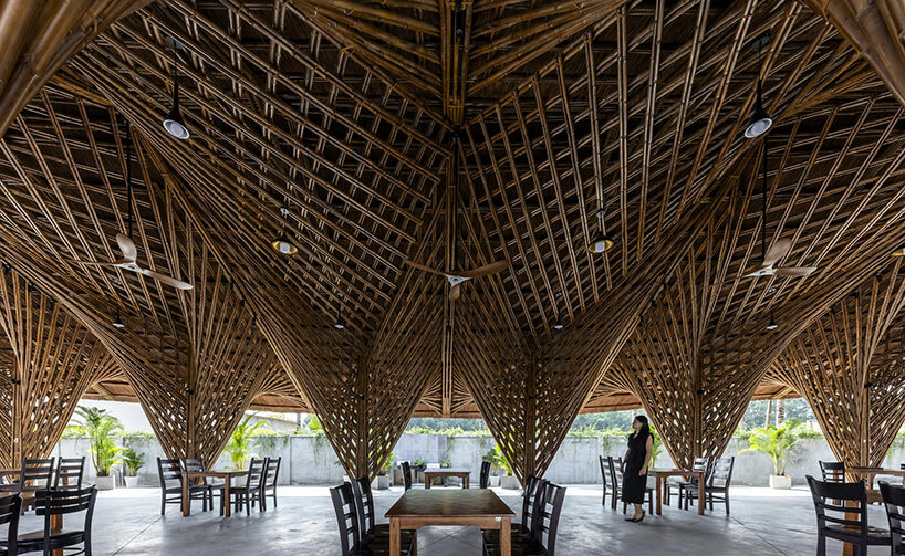 bambubuild sculpts complex geometries with bamboo and thatch in vietnam