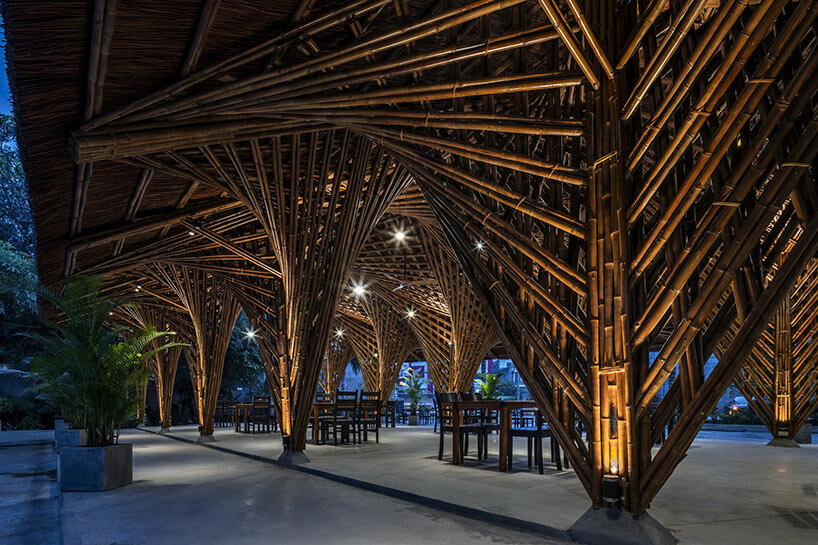bambubuild sculpts complex geometries with bamboo and thatch in vietnam