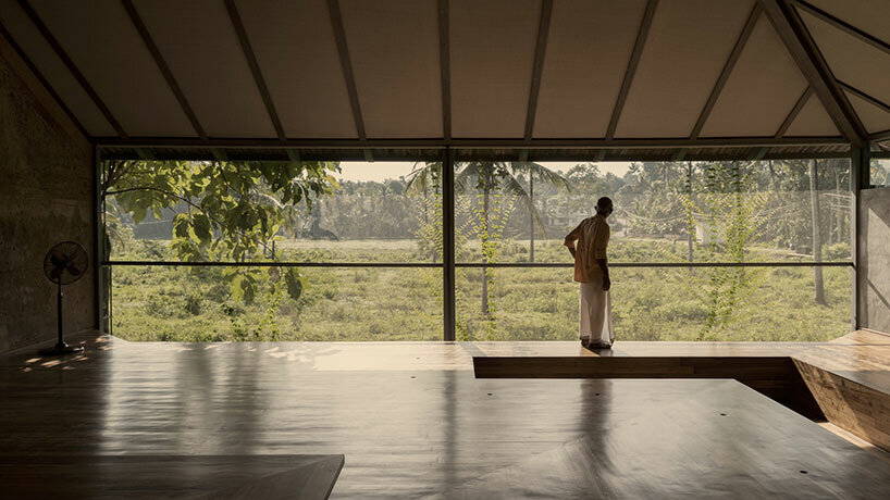 a tiled rooftop amphitheater encloses wallmakers' nisarga art hub in india