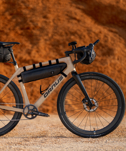 crafted from laminated ash wood layers, ornus bike absorbs vibrations for a smoother ride
