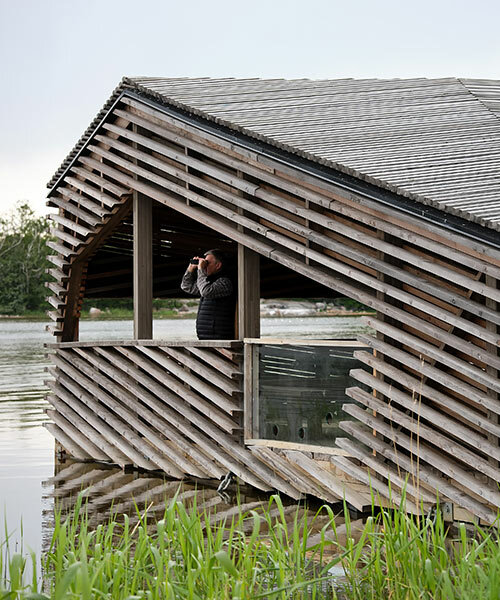 studio puisto designs floating 'piilokoju' hut for birdwatchers in finland