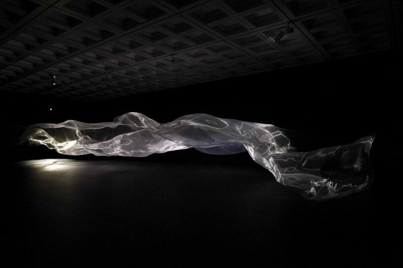 shinji ohmaki's delicately carved vessels cast shadows of flowers at national art center, tokyo