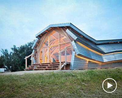zinc panel cladding wraps wooden retail store by VUILD in western japan