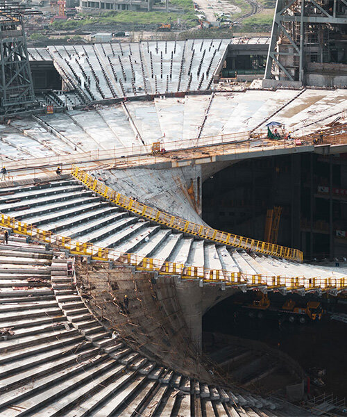 snøhetta shares construction progress of spiraling grand opera house in shanghai