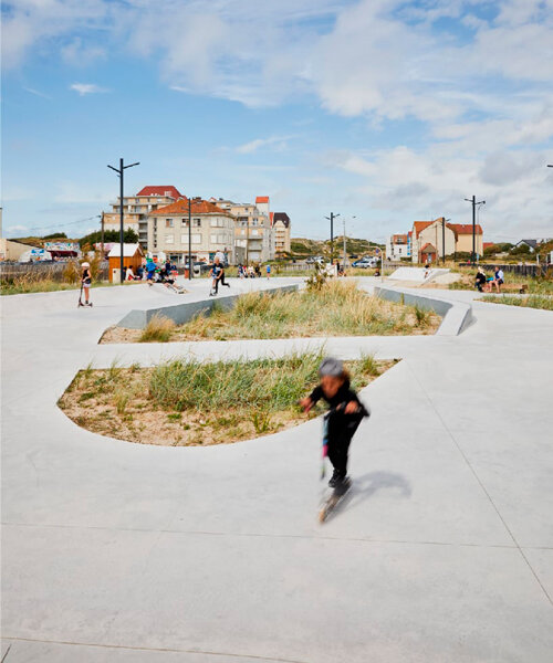 skate park's concrete curves weave seamlessly into stella plage's urban landscape in france