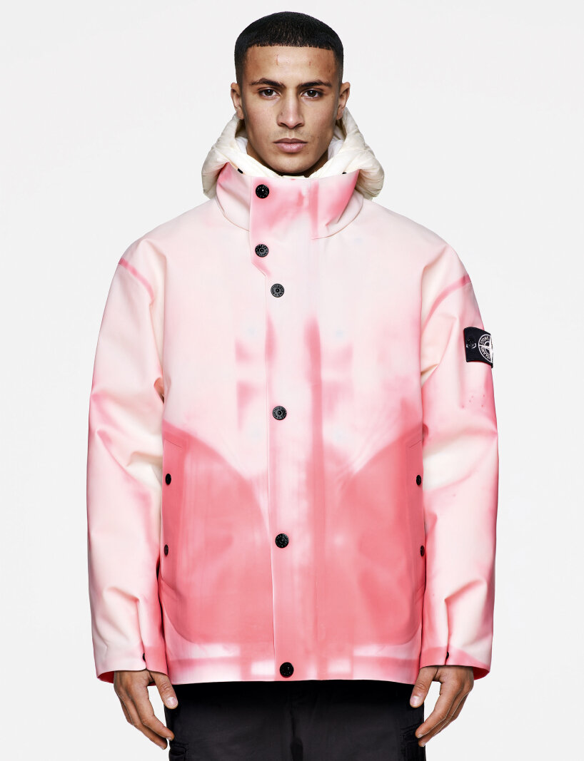 stone island's thermal-reactive ice jacket slowly changes its color from  hot pink to cold white