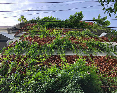 red terracotta bricks envelop RENESA’s 'terramater' gallery in india