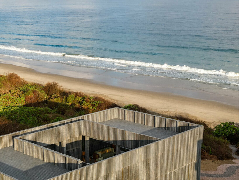 UAVI pavilion by PPAA is an ephemeral wooden haven rising above mexico's sandy shores