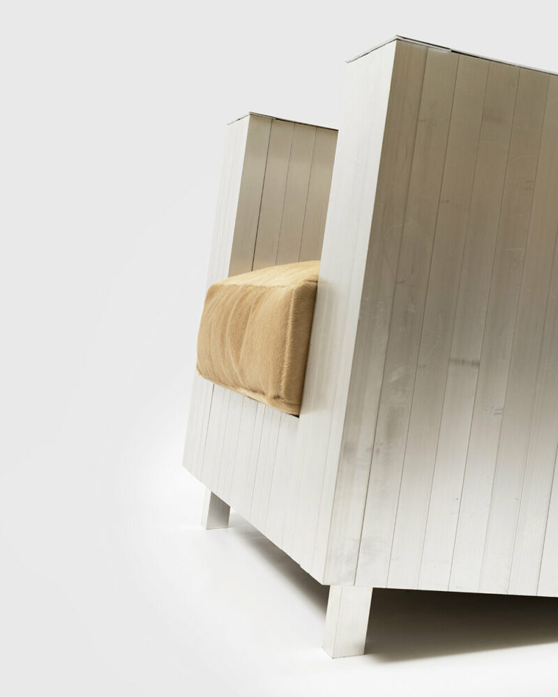 studio HAOS combines zinc sheets and aluminum tubes to craft antimatière furniture series