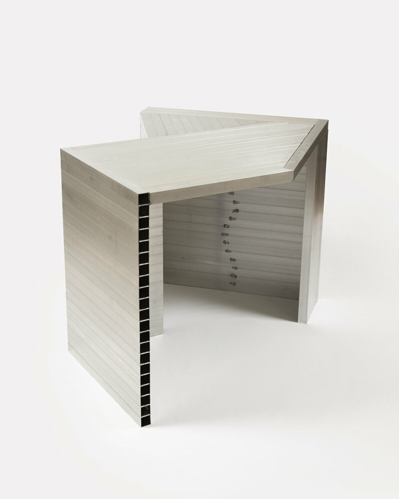 studio HAOS combines zinc sheets and aluminum tubes to craft antimatière furniture series
