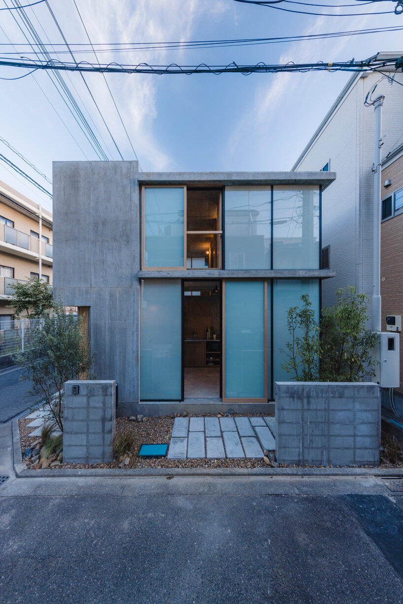 IGArchitects explores interconnectedness and privacy within concrete house in japan