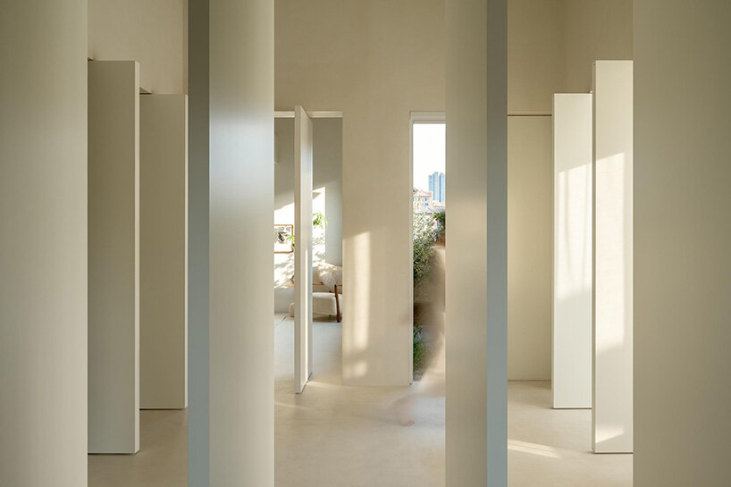 HAS design & research hides this 'forest villa' among lush gardens