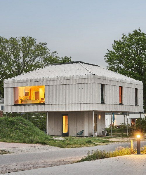 wirth architekten balances neo-palladian dwelling on core concrete podium in germany