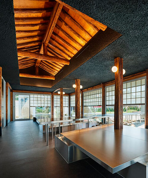 traditional wooden hanok roof frame tops nomal's renovated restaurant in korea