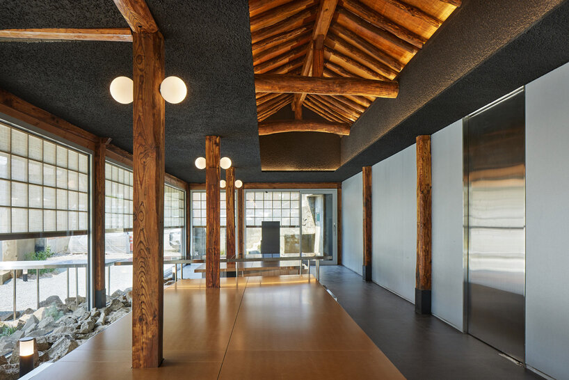 traditional wooden hanok roof frame tops nomal's renovated restaurant in korea