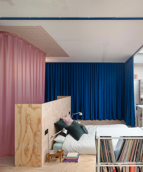 curtains and glazed surfaces arrange theatrical apartment layout by BUREAU in switzerland