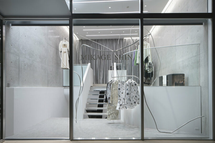 stainless steel tubes curve and flow across the mikage shin aoyama store in tokyo