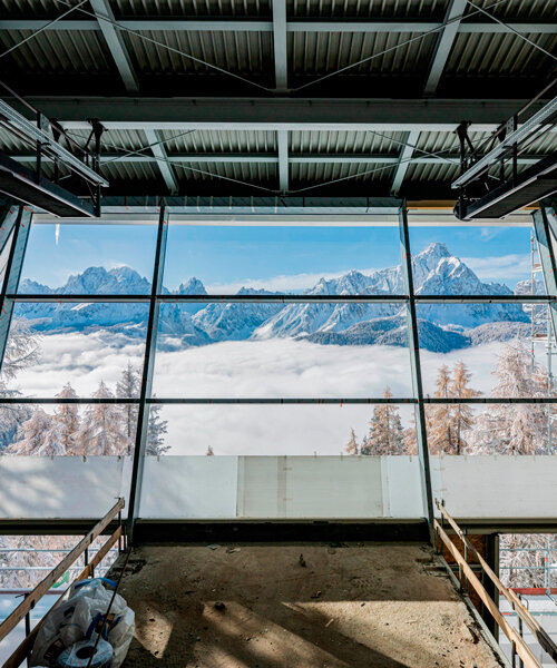 museum's glazed facade offers panoramic views of mount elmo in italy
