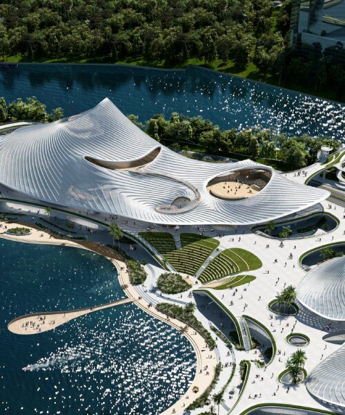 MAD architects' nanhai art center in china emerges from the lake like endless ripple of water
