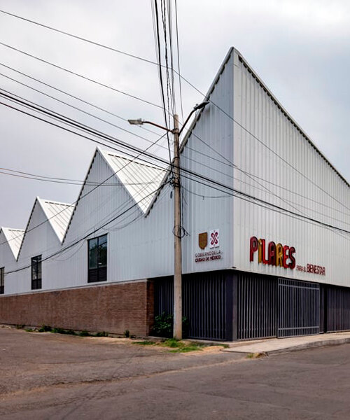 metallic roof shapes triangular folds atop a|911's cultural infrastructure in mexico city