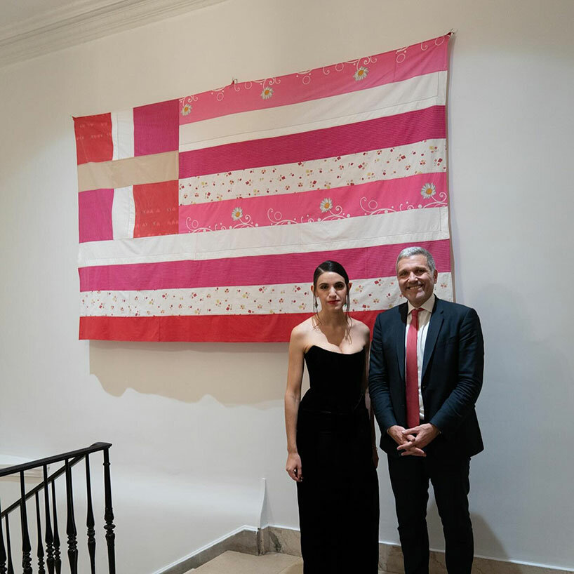 pink greek flag made of bed sheets by artist georgia lale addresses domestic violence