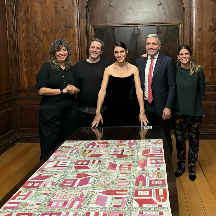 pink greek flag made of bed sheets by artist georgia lale addresses domestic violence